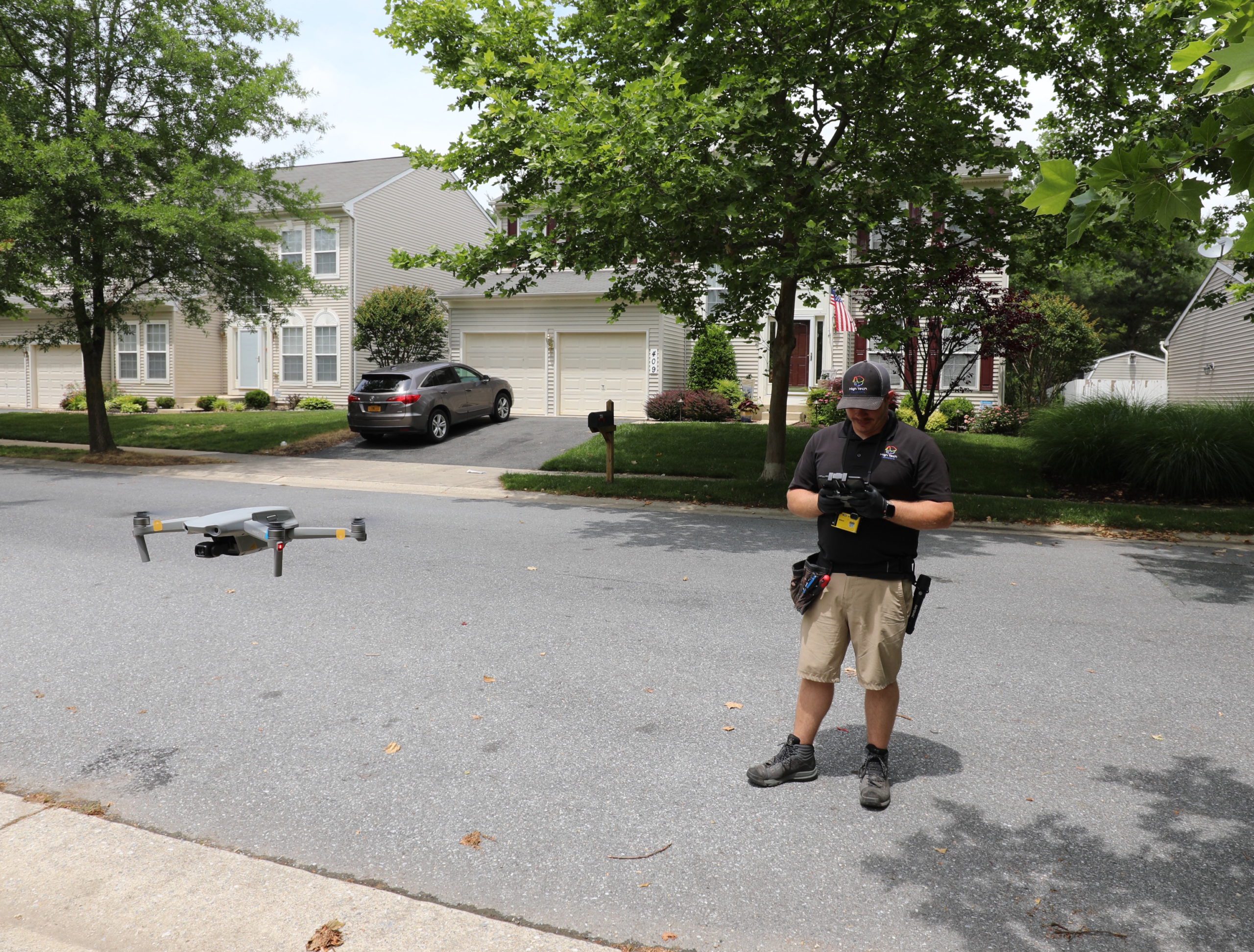 High Tech Inspections employee using a drone for home inspections