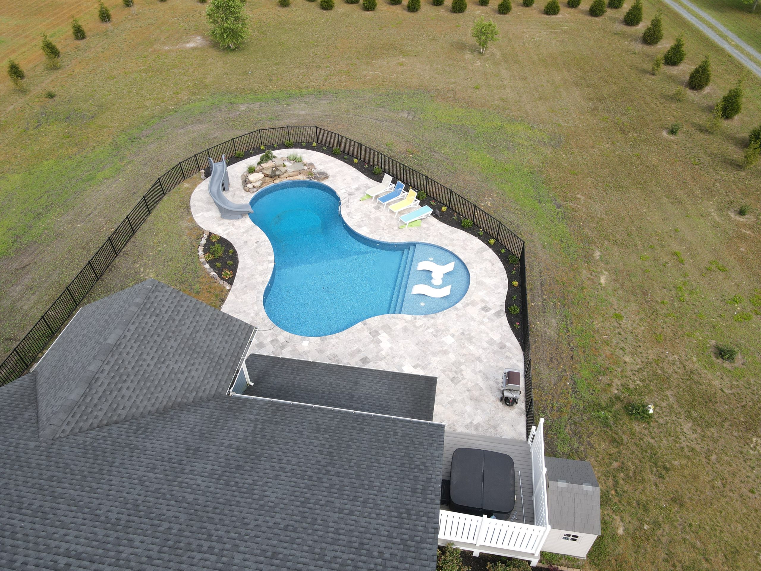 drone shot of an inground swimming pool